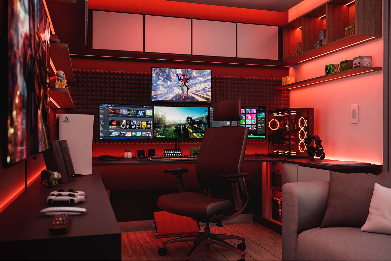A gaming room with multiple monitors and red lighting