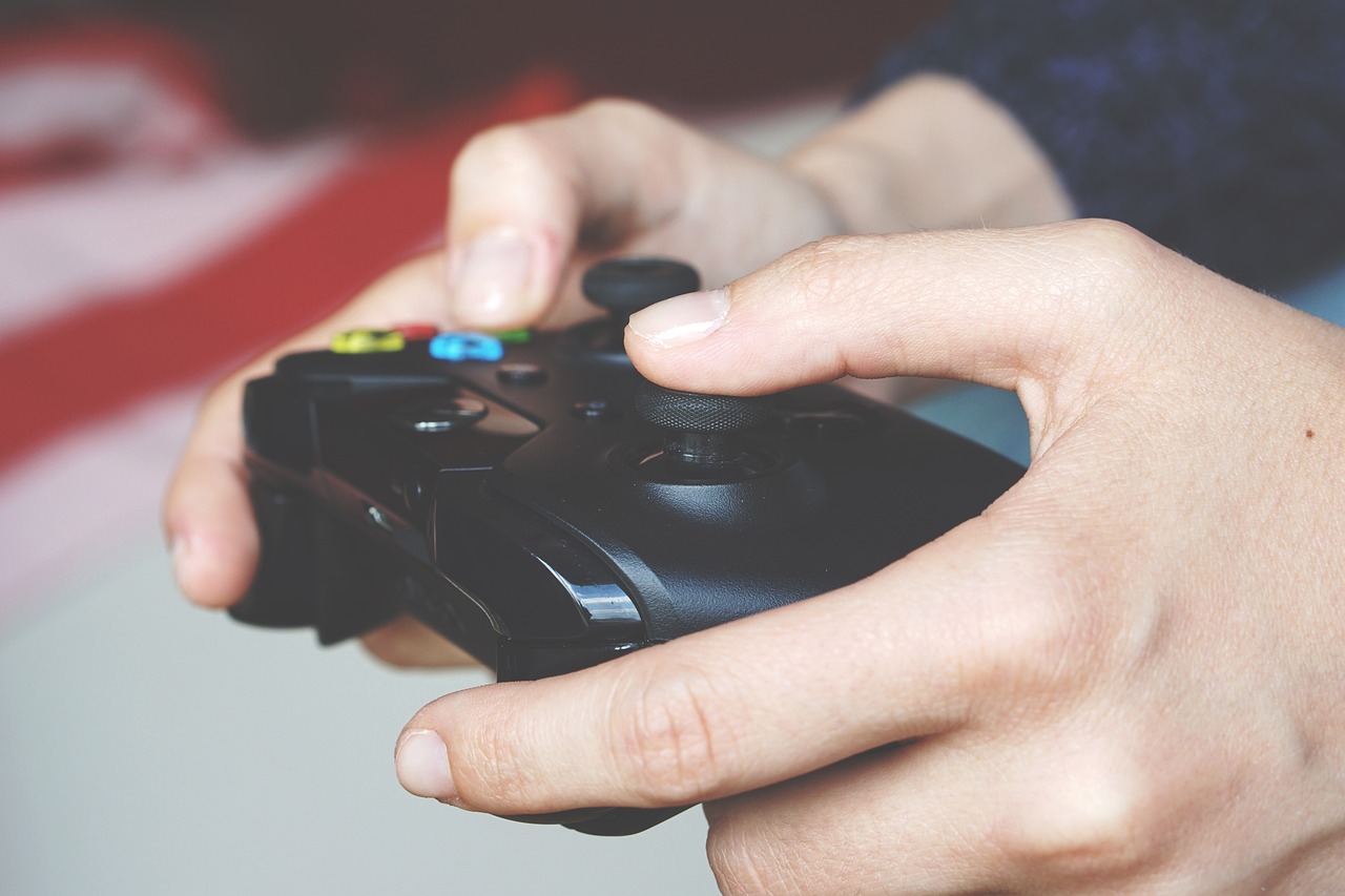Hands holding a game controller