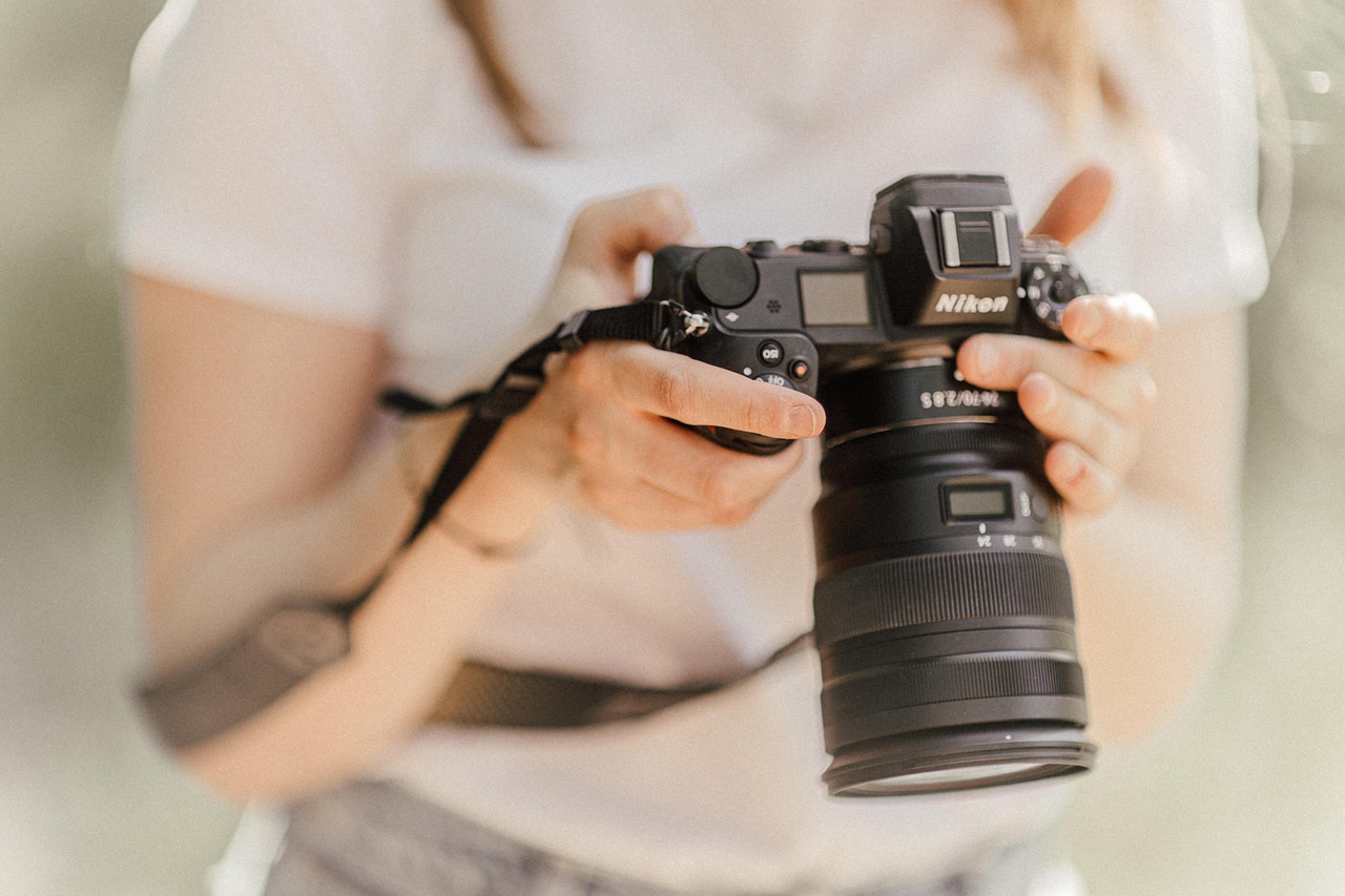Hands holding a camera
