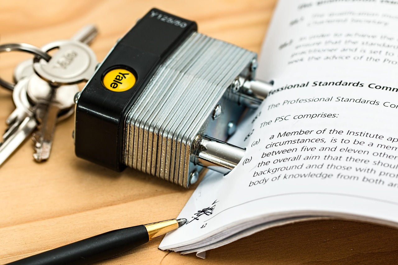A padlock on a document of professional standards