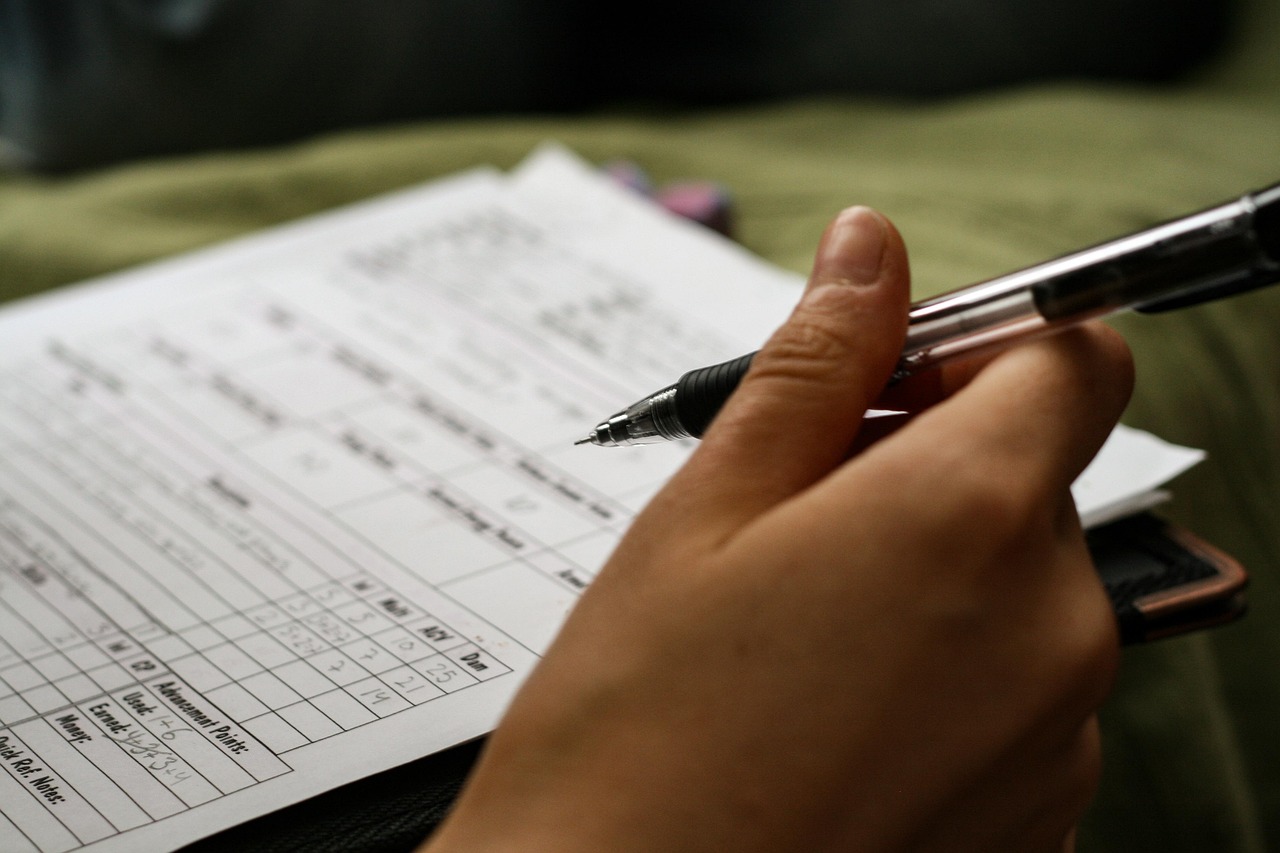 A person filling in a survey form
