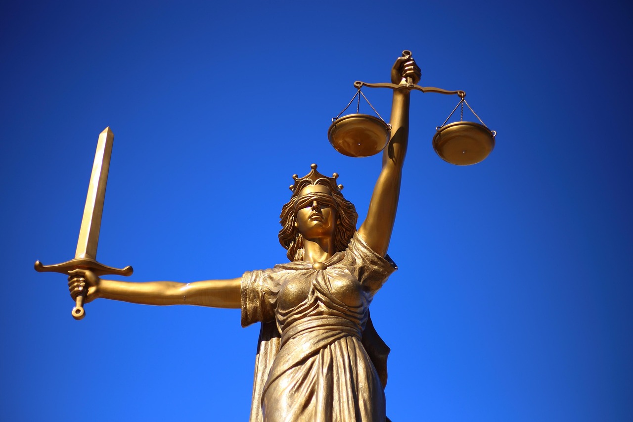 A statue of Justice holding scales