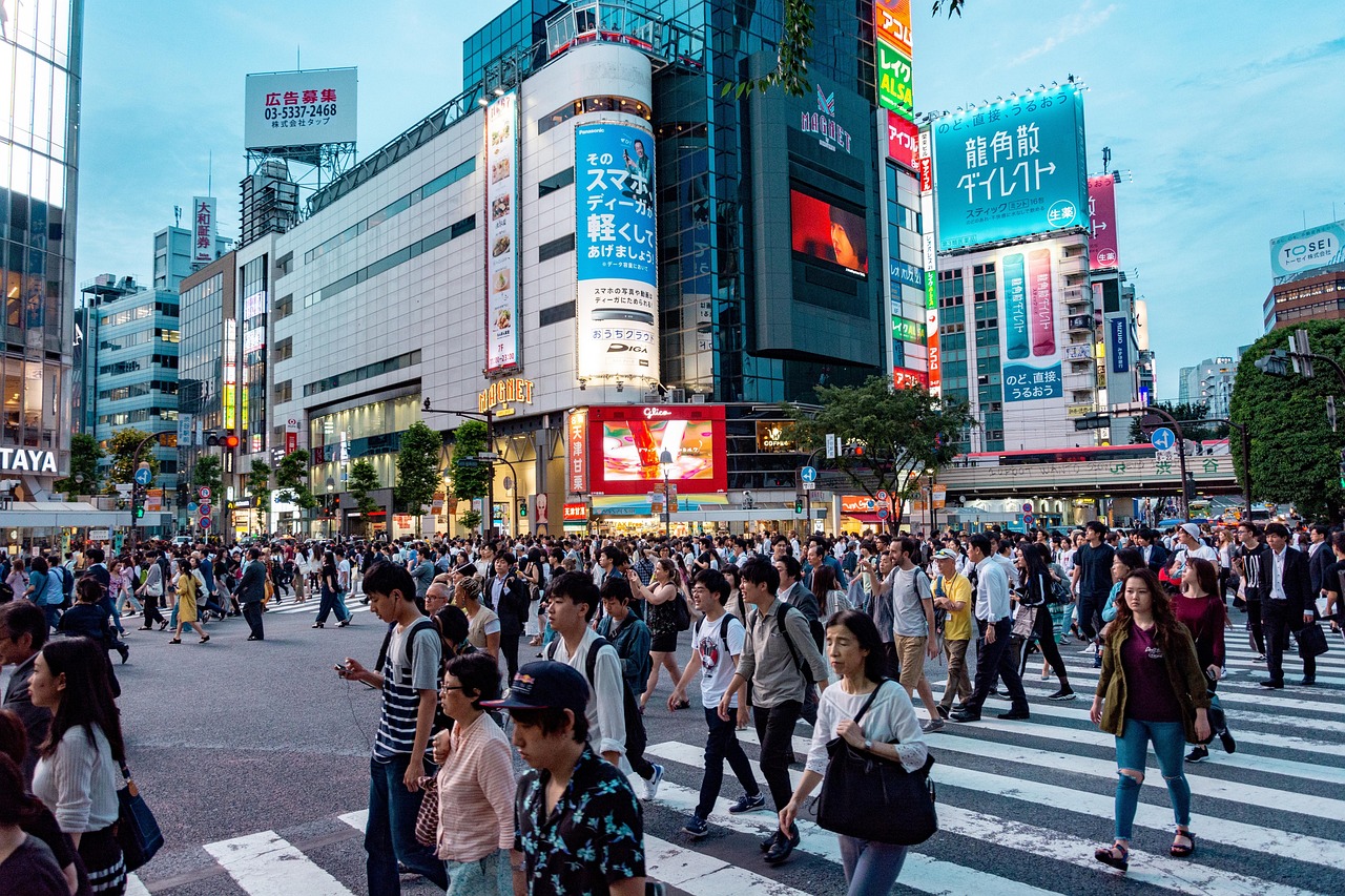 Crowds crossing the Shibuya scramble in Tokyo