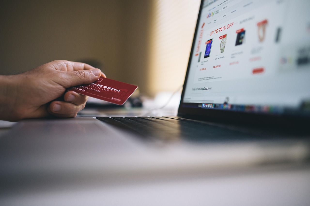 A shopper paying by card on an online store